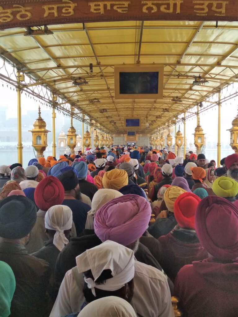 Travel tips for India - Golden Temple of Amritsar full of Sikhs